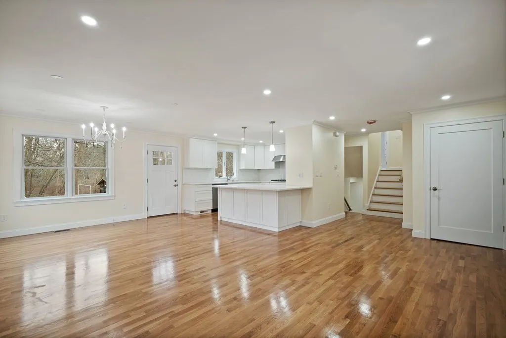 Open living area and kitchen in the Amesbury home
