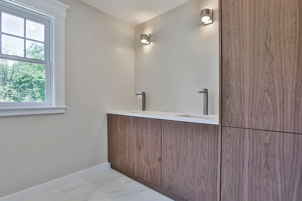 Walnut bathroom vanity in the Amesbury home